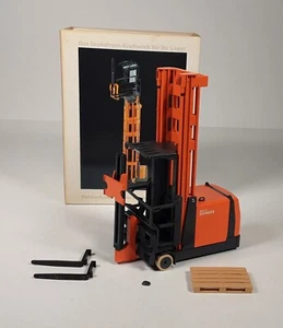 Conrad, carrello elevatore tre lati WA15 Capricorno Boss, 1:25, IMBALLO ORIGINALE #VG94 - Foto 1 di 23