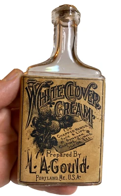 Antigua botella en relieve con etiqueta BLANCO TRÉBOL CREMA L. A. GOULD Portland Maine! Foto 1 de 4