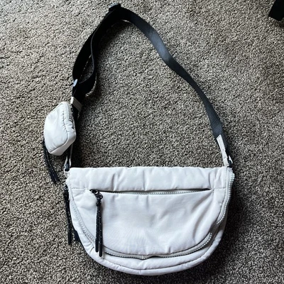 MOVIMIENTO FREE PEOPLE - Cartera Hit the Trails Beige con Bolsa Movimiento FP Bandolera Foto 1 de 4