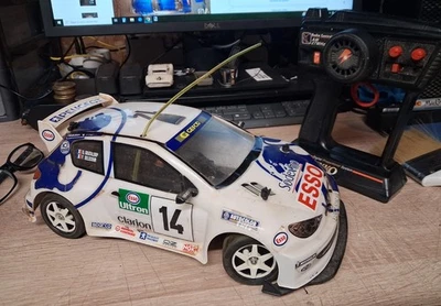 Voiture télécommandée Peugeot 206 WRC Nikko 1/14e - Photo 1/4