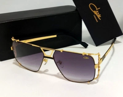 Gafas de sol Cazal marco dorado y negro lentes tintadas grises gafas unisex Foto 1 de 4