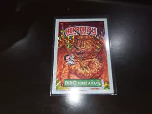 C22: Horrorible Kids Series 9 DINO Sores Attack FOIL #297a GPK Garbage Pail Kids - Picture 1 of 5