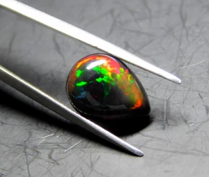 Natural Black Ethiopian Opal - 11x8 MM Pear Loose Opal Cabochon Multi Fire Opal - Picture 1 of 6