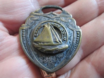 Antiguo RELOJ PUBLICITARIO GRAN LAGO COLORADO LLAVERO Foto 1 de 4