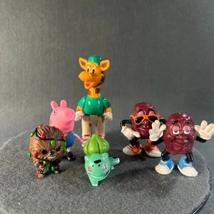 Lote California Raisins Geoffrey Toys R Us Advent Chewbacca Bulbasaur George - Imagen 1 de 20