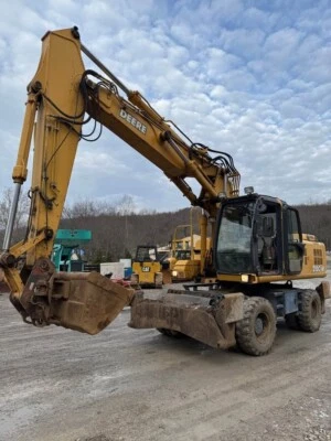 Deere 210CW 2006 excavadora de ruedas Foto 1 de 4