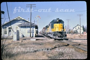 F Original Slide - CNW C&NW 879 Action w/ Freight at Merrilan WI Depot 1981 - Picture 1 of 1
