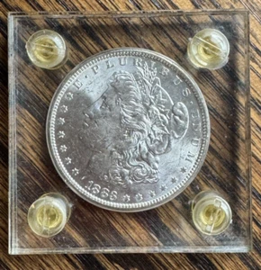 1883 O Morgan Silver Dollar $1 BU in plastic holder - Picture 1 of 5