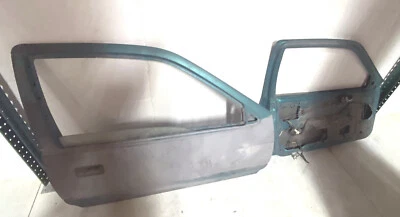 Left & Right Front Door 2 Door for 1990 thru 1994 Geo Metro  / Suzuki Swift 2 DR - Image 1 of 4