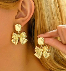 Clip on 1 3/4" large gold dangle hammered bow earrings - Picture 1 of 4