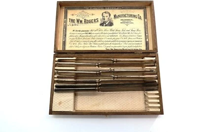 Antiguo Juego de 8 Cuchillos WM Rogers Plateado en Caja Original Madera con Melas Foto 1 de 4
