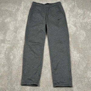 Pantalones deportivos Nike Dri Fit para hombre gris medio informales cónicos - Imagen 1 de 7