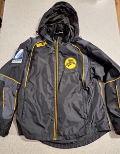 Chaqueta de lluvia Glenelg Tigers SANFL, con capucha. Talla pequeña negra - Imagen 1 de 7
