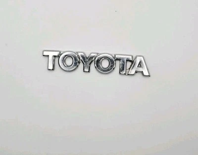 2003-2008 TOYOTA COROLLA REAR TRUNK LID EMBLEM LOGO BADGE SYMBOL OEM  - Image 1 of 3