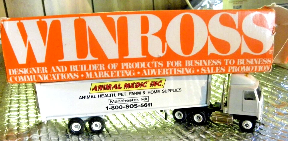 ANIMAL MEDIC INC MANCHESTER PA. TRACTOR & TRAILER 1991 WINROSS Die-cast  Semi - Image 1 of 4