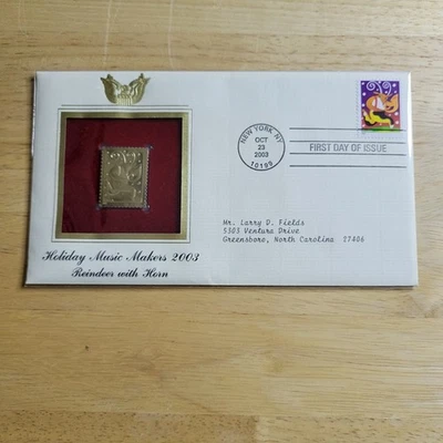 Holiday Music Makers 2003 Reindeer 22kt Gold Replica Stamp 1st Day Issue w/card - Image 1 of 4