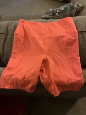 Женские велосипедные шорты Athletic Works 7 дюймов с боковыми карманами оранжевые XS (0-2) - Изображение 1 из 4