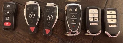 6 Vehicle Keys, 2 Mercedes E350, 2 Honda, 1 Nissan, 1 Chevy Traverse - Image 1 of 4