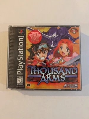 Thousand Arms (Sony PlayStation 1, 1999) Box + Manual, slight case damage - Image 1 of 4