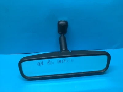 Espejo retrovisor manual Chevy Geo Metro 95-01 OEM usado. e1301572 Foto 1 de 4