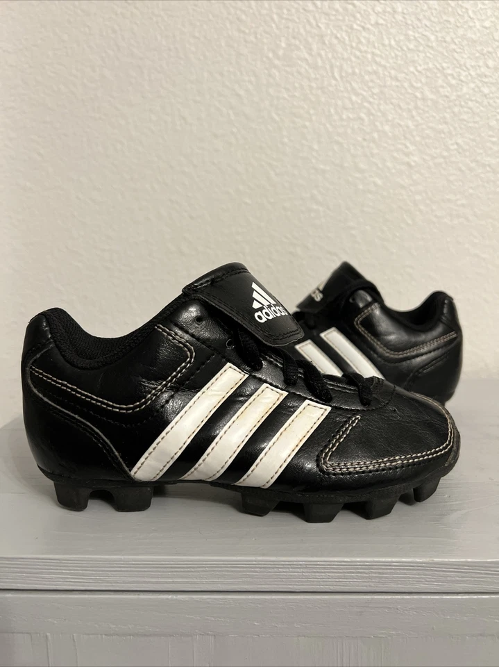 TACOS DE FÚTBOL ADIDAS CHANGE UP MD NIÑOS NEGROS TALLA 12K (USADOS) Foto 1 de 4