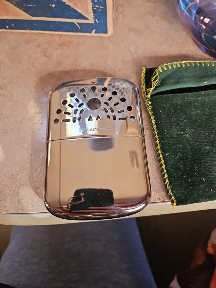 Peterson's Peacock Pocket Hand Warmer Made In Japan Chrome Vintage w/bag unused - Image 1 of 3