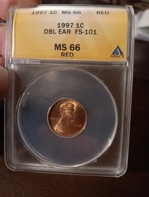 👉1997 DOUBLE EAR ERROR FS-101 ANACS MS66 RED - Image 1 of 2
