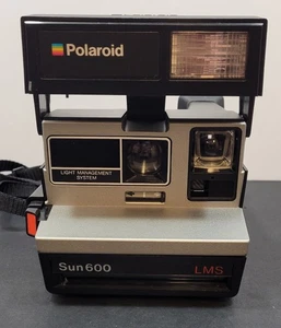 Macchina fotografica vintage Polaroid Sun 600 LMS pellicola con manuale, istruzioni e pellicola tipo 600 - Foto 1 di 16