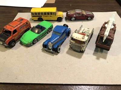 Lote ZL 7 Hot Wheels anos 80 carros lixo Bugatti ônibus van reboque corrosivo Baja Steve’s - Imagem 1 de 4