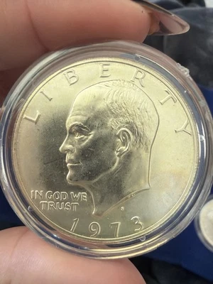 1973 年 S 版艾森豪威尔美元 • 40% 精制银币 • 带胶囊 • 艾克美元 — 第 1/2 张图片