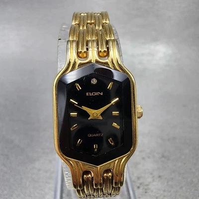 Reloj Elgin Mujer 17mm Esfera Negra Tono Dorado Hexágono EL394 Batería Nueva Foto 1 de 4