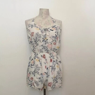 Mono Kendall & Kylie Talla 10 Cuello Halter Blanco y Multicolor Estampado Floral Foto 1 de 4