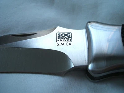 Vintage SOG Tomcat S.M.CA. folding Knife.  New old stock / No box / with Gifts. - Image 1 of 4