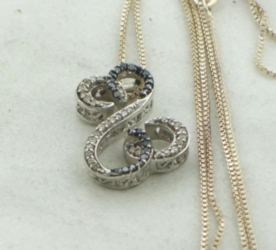 CADENA COLGANTE CORAZONES ABIERTOS DIAMANTE BLANCO Y NEGRO JANE SEYMOUR PLATA ESTERLINA ex Foto 1 de 4