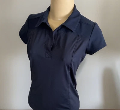 Camisa polo de golf Athleta tenis ventilada elástica a la par azul para mujer talla 2XS 489124 Foto 1 de 4