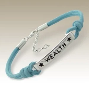 Sterling Silver Bracelet inspirational tag WEALTH blue cord UNIQUE. Secure clasp - Picture 1 of 1