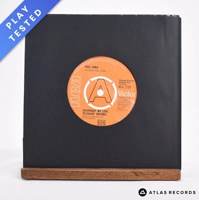 Paul Anka - This Crazy World - Promo 7" Vinyl Record - VG+ - Image 1 of 3