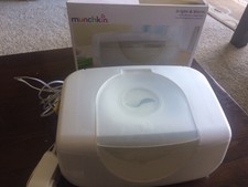 Munchkin Wipe Warmer for keeping wipes warm during winter night diaper changes.