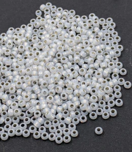 Perline semi vetro vintage TOHO Giappone opale latteo bianco argento foderato 8/0 14 gr - Foto 1 di 3