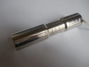 Linterna antorcha BLANCA de acero inoxidable AA 14500 3 modos alta baja con cordón - Imagen 1 de 7