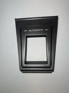 1983-1989 MITSUBISHI STARION CHRYSLER CONQUEST OEM AUTOMATIC SHIFTER SURROUND - Picture 1 of 7