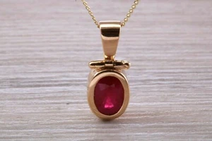 Oval cut Ruby set Yellow Gold Solitaire Necklace - Picture 1 of 8