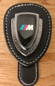 Soporte con clip para visera para gafas de sol BMW serie M negro - Imagen 1 de 5