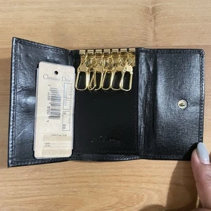 Portafoglio vintage Christian Dior in pelle portachiavi compatto nero e oro bifold - Foto 1 di 9