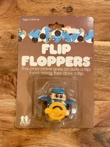 Tomy 1978 vintage - Flip Floppers Nº 2519 - Wind Up Crazy Plane - Nuevo en tarjeta - Imagen 1 de 3