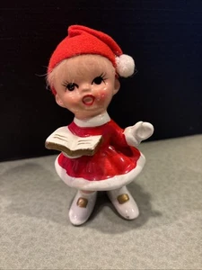 36) VINTAGE NAPCO TOVAGLIOLO GIAPPONE Natale CANTO RAGAZZA con OUTFIT ROSSO e LIBRO - Foto 1 di 7