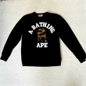 A Bathing Ape BAPE 1st Camo College Sweatshirt mit Rundhalsausschnitt schwarz – US Herren XL - Bild 1 von 12