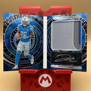 Jahmyr Gibbs 2023 Spectra Rookie Optics Hyper Black Light Auto Booklet /40 Lions - Picture 1 of 8