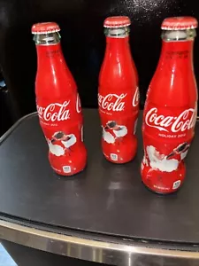 Coca-Cola Wrapped Bottle (Holiday 2012) voll und ungeöffnet - Bild 1 von 5