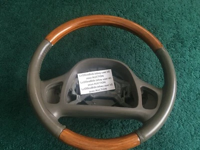 Volante Lincoln Continental PARCHMENT madera clara EXCLUYE CABLEADO, SWC,.. Foto 1 de 4